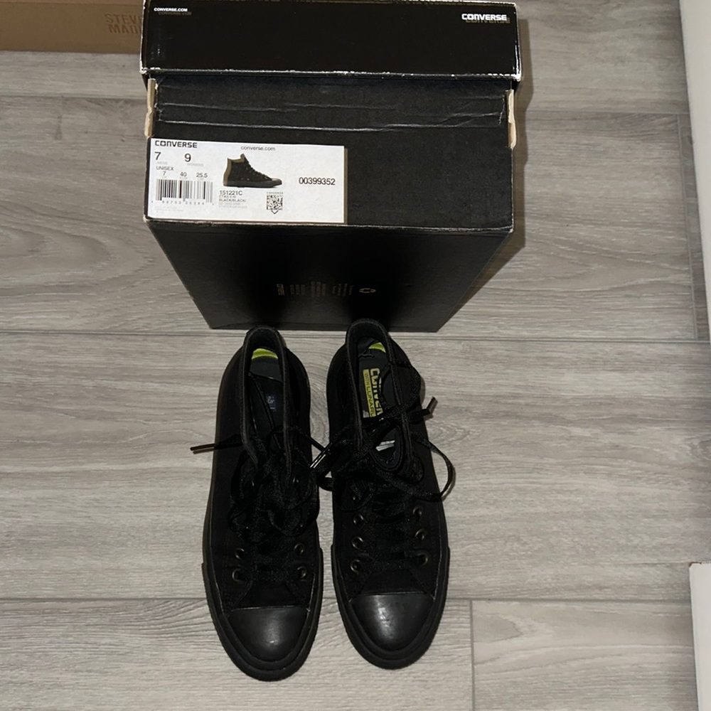 All black high top converse